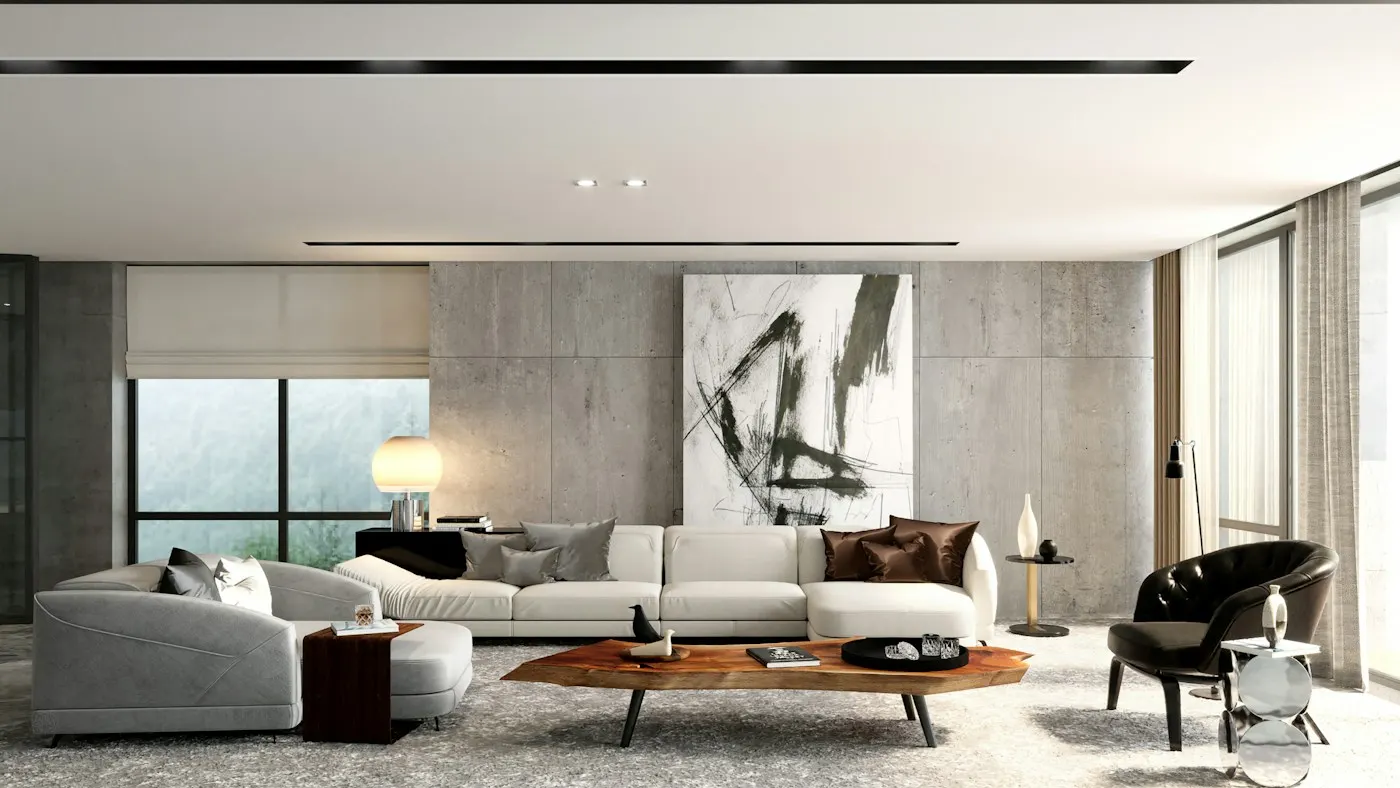 Sala de estar moderna e clara, com sofá branco e obra de arte na parede